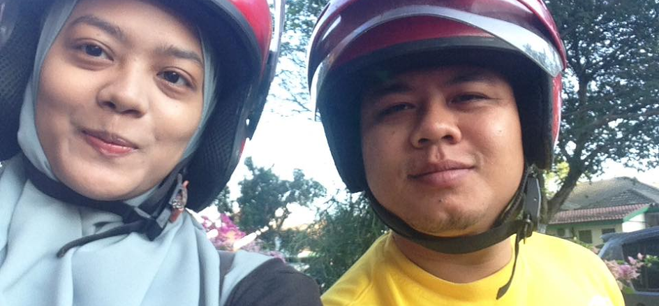 Maryam and Fadzel on their 16-year-old motorcycle.