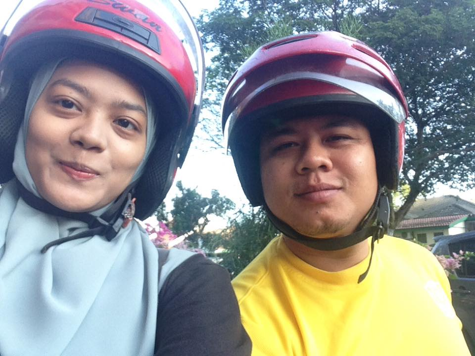 Maryam and Fadzel on their 16-year-old motorcycle.